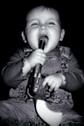 child with gun to his or her mouth