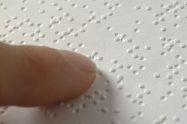 finger reading braille