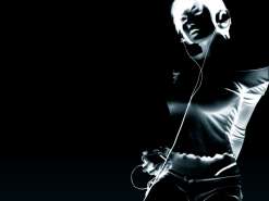 Negative image--woman wearing headphones